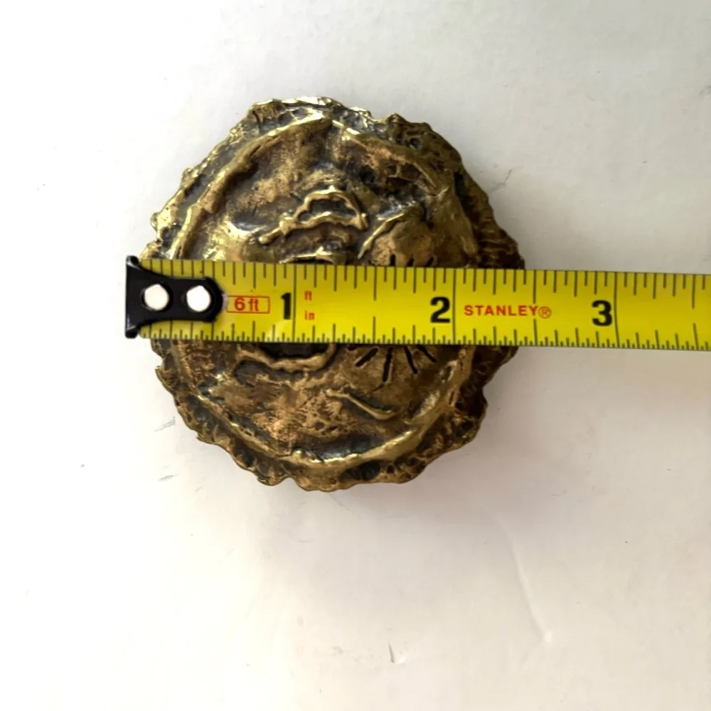 Three vintage belt buckles